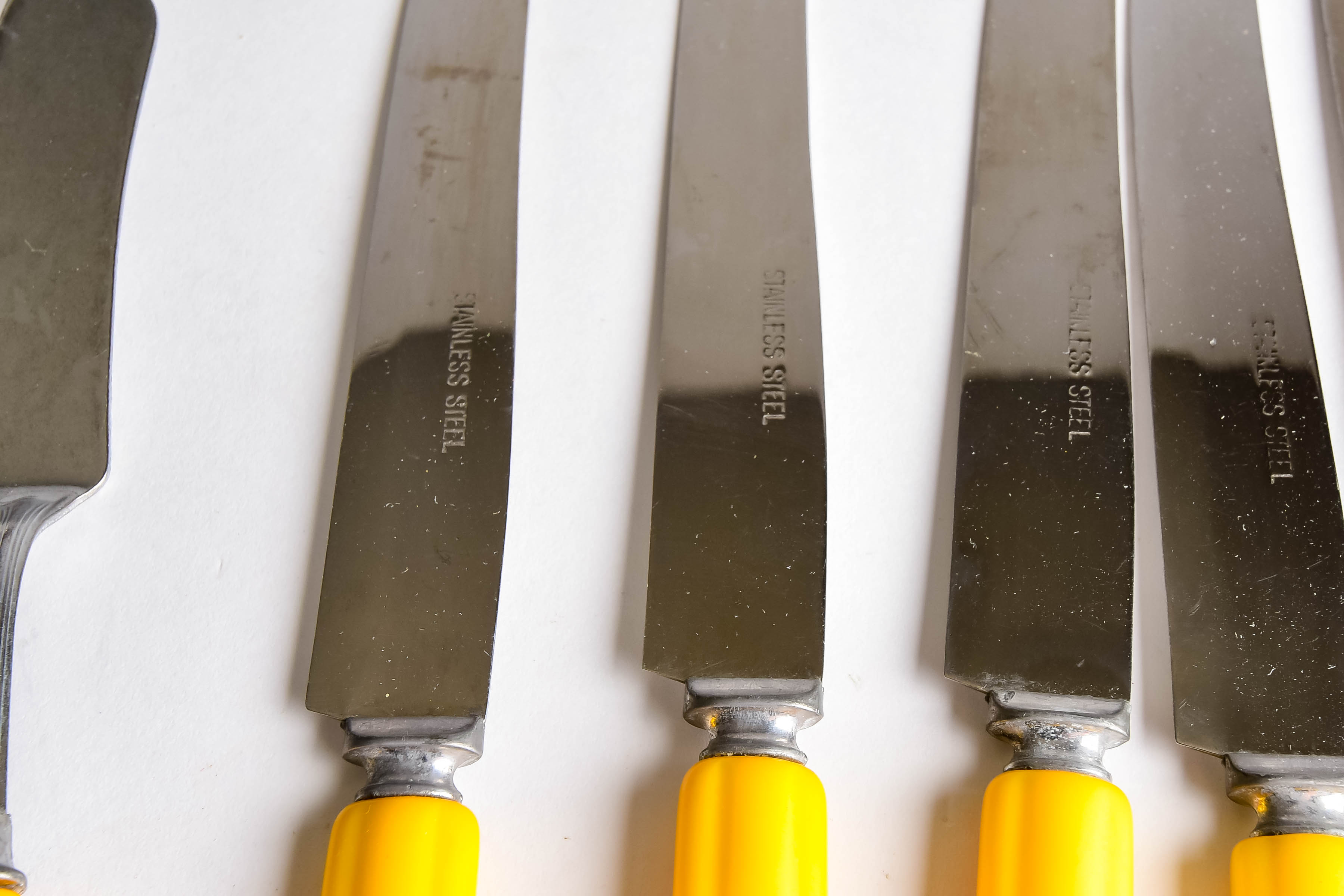 Collection of Vintage Stainless and Bakelite Flatware