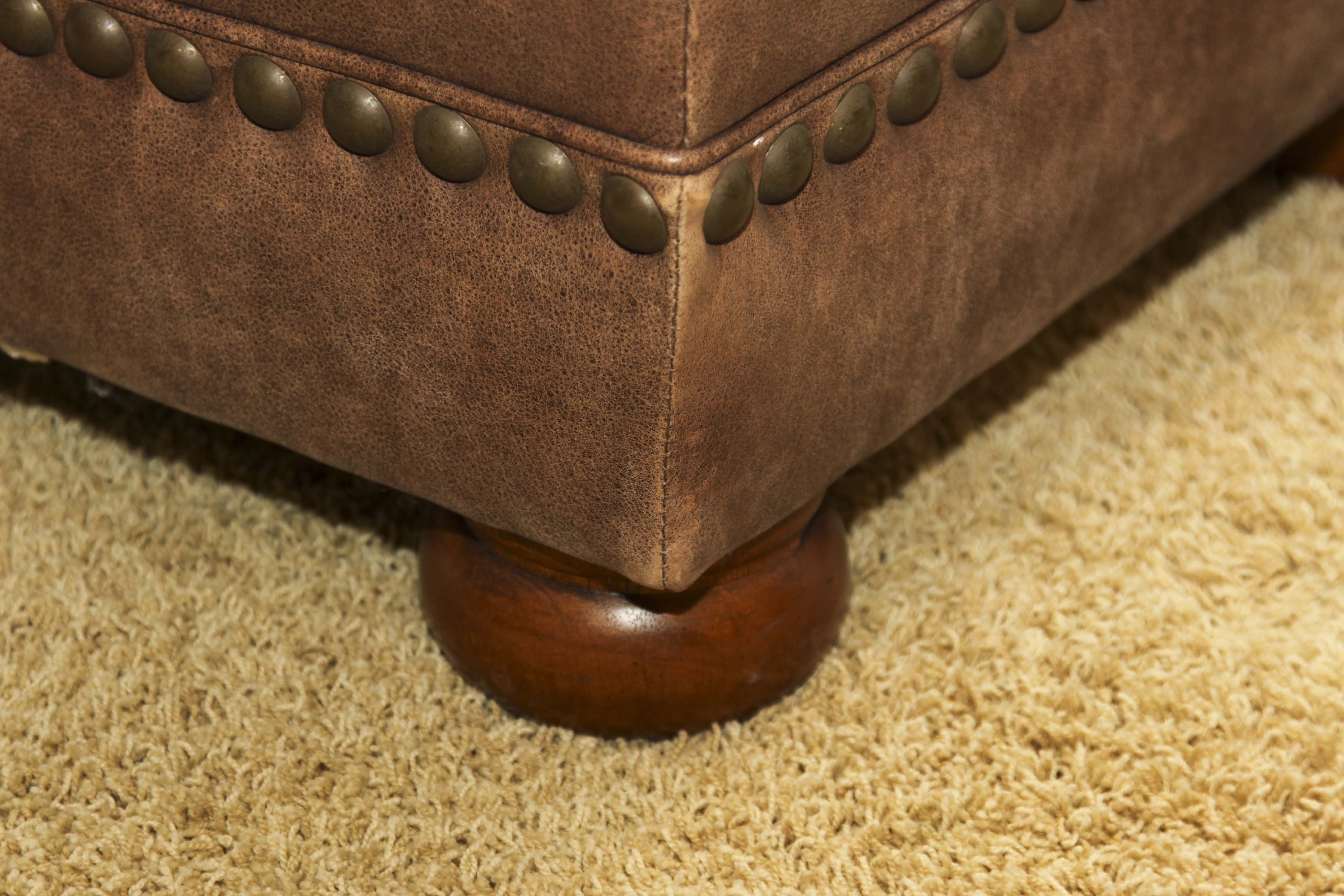 Faux Leather Loveseat and Ottoman with Tack Trim
