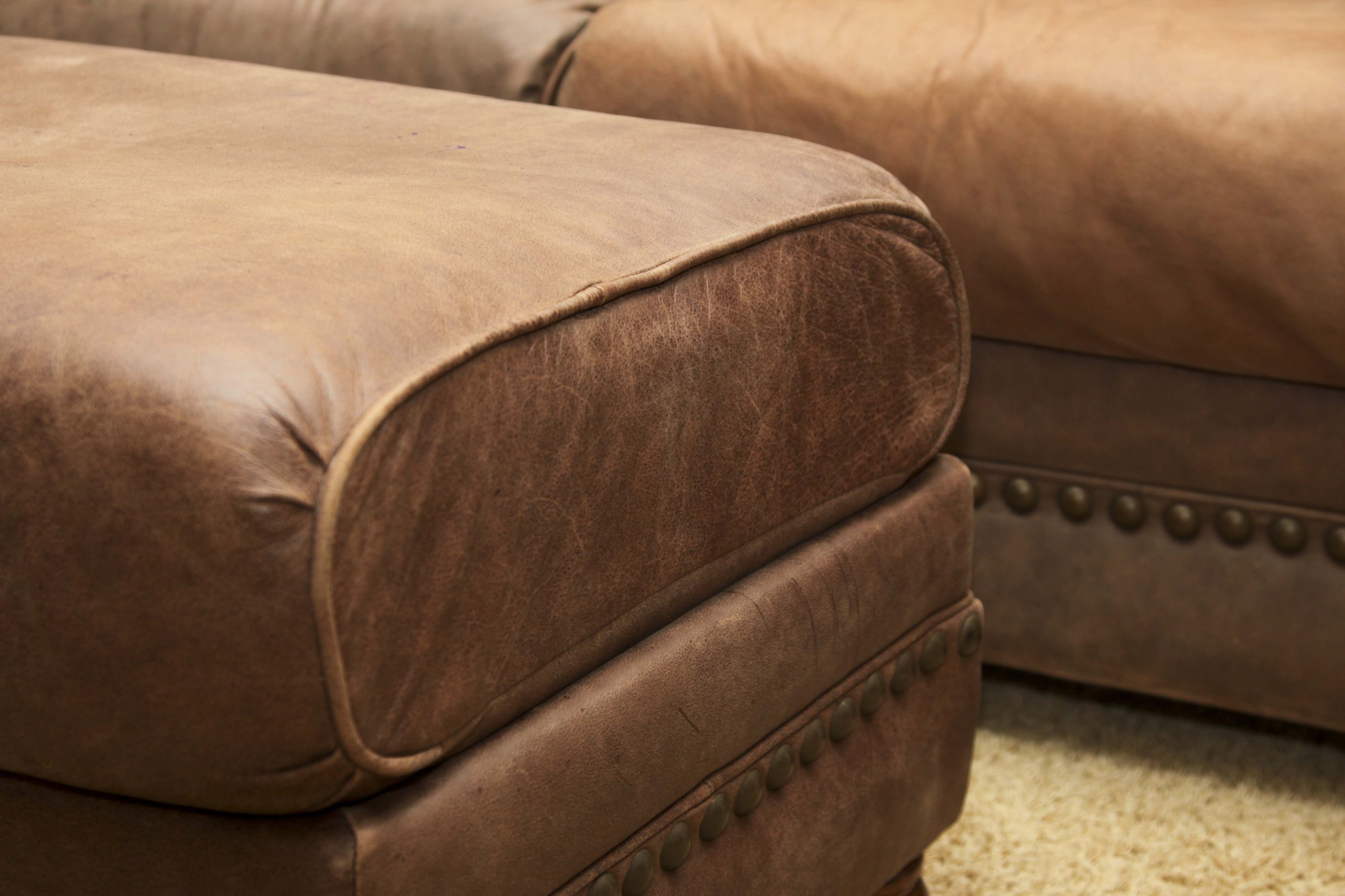 Faux Leather Loveseat and Ottoman with Tack Trim
