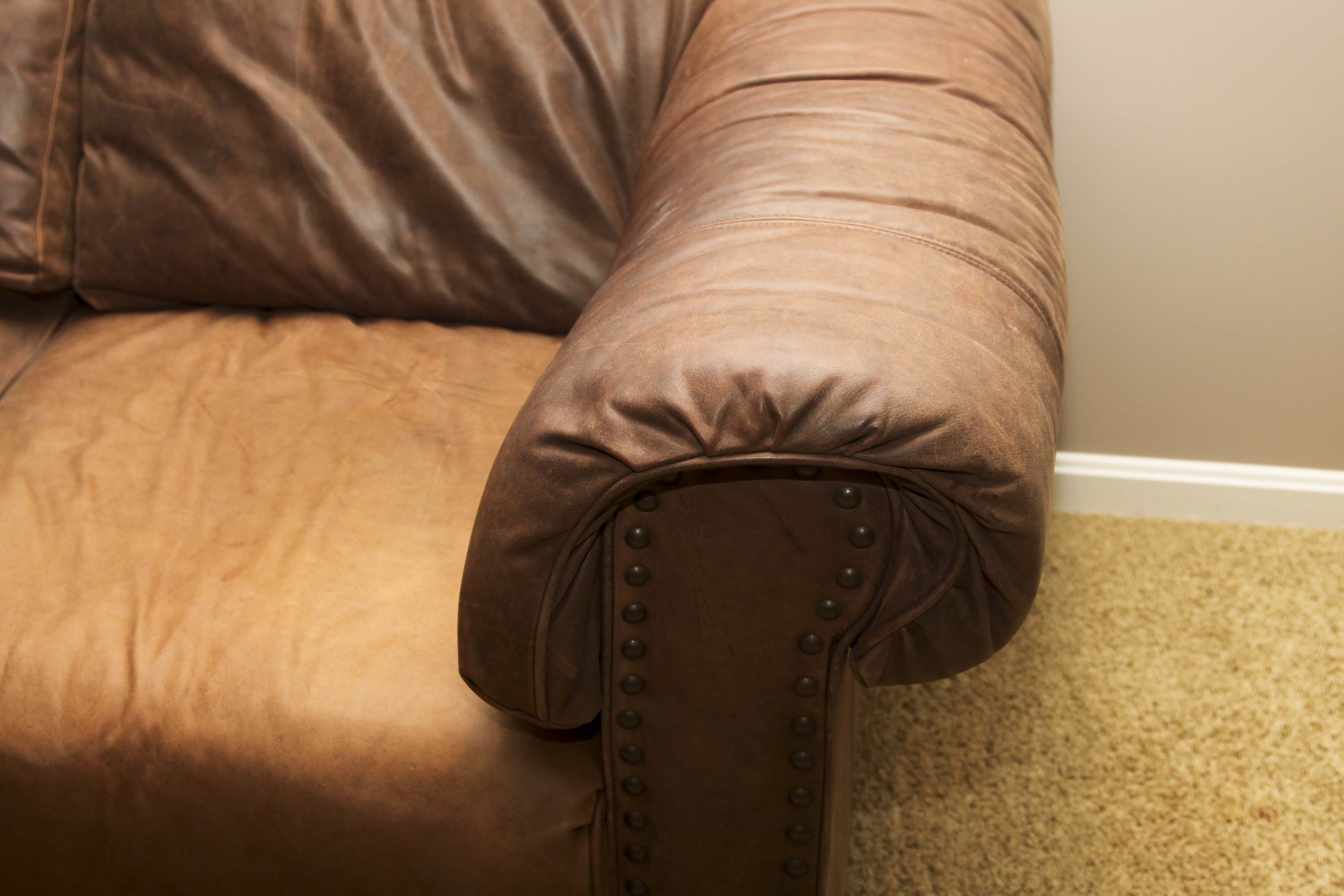 Faux Leather Loveseat and Ottoman with Tack Trim