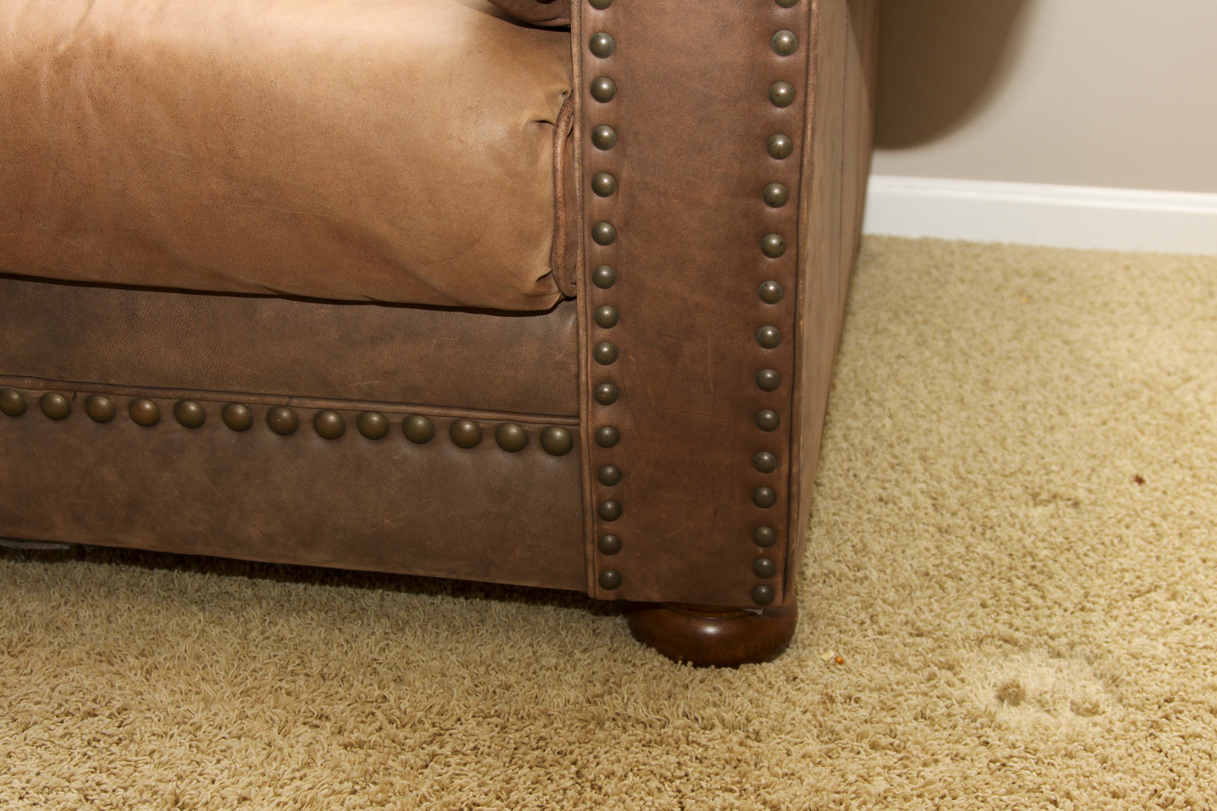 Faux Leather Loveseat and Ottoman with Tack Trim