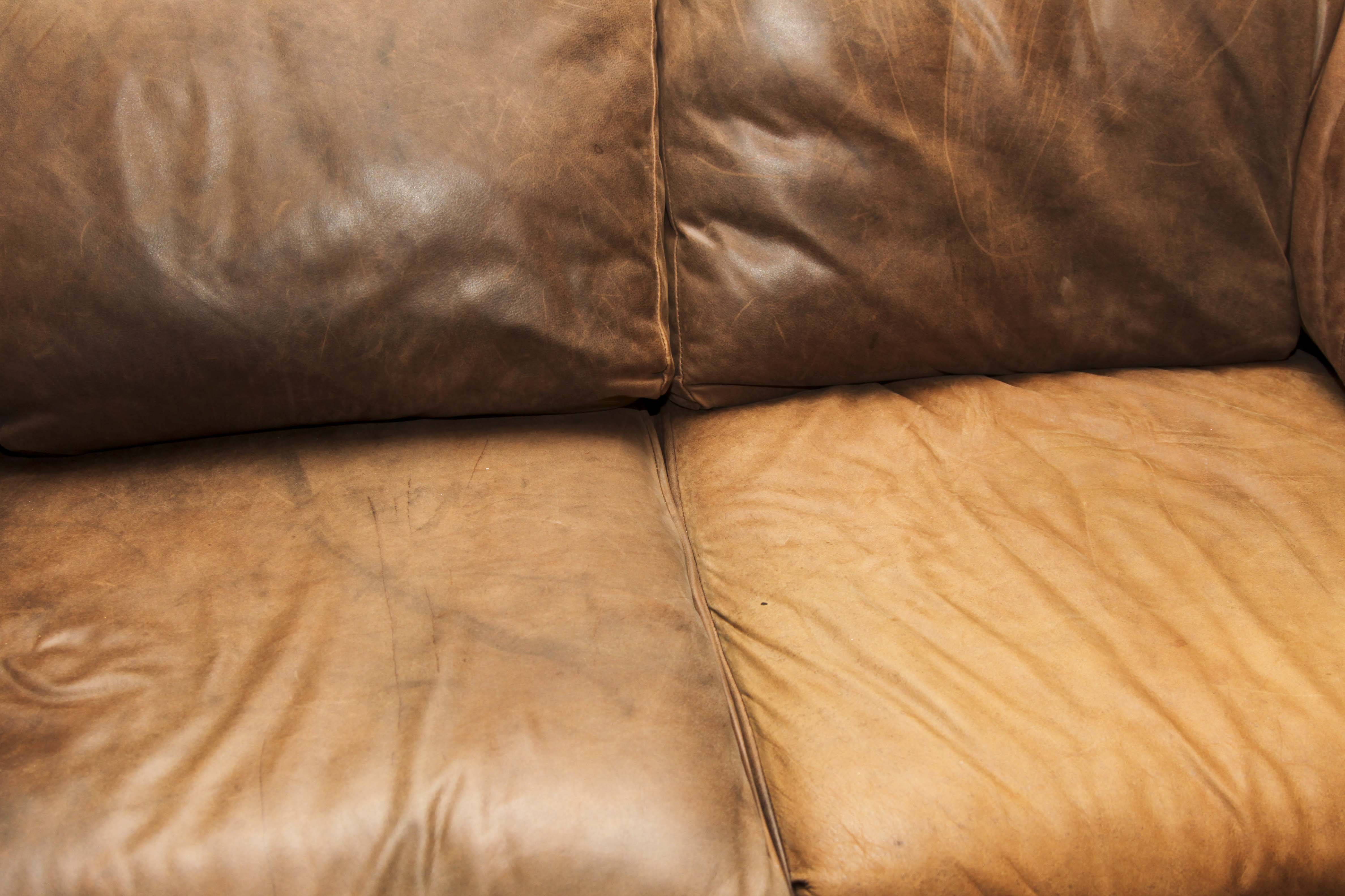 Faux Leather Loveseat and Ottoman with Tack Trim