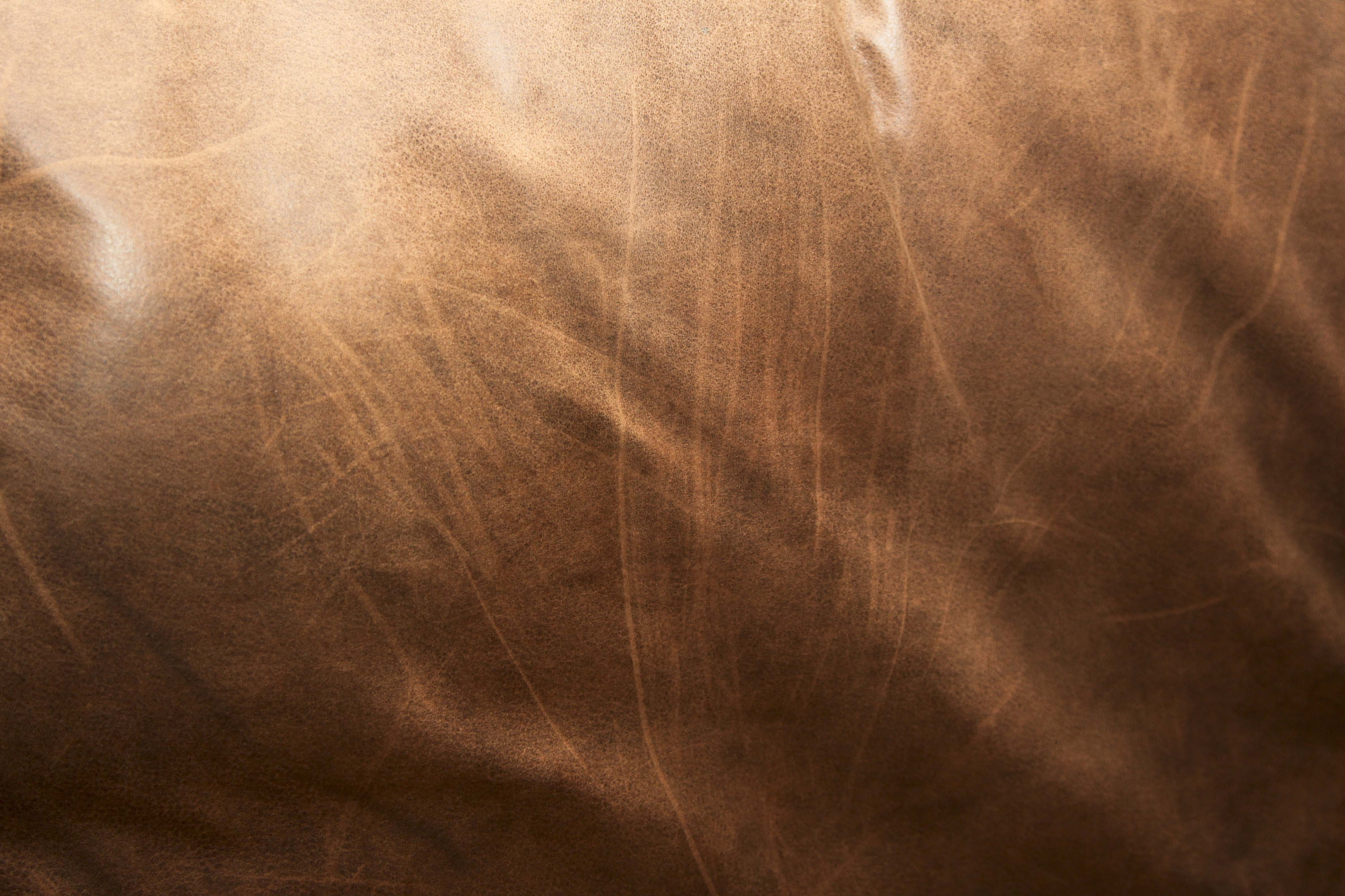 Faux Leather Loveseat and Ottoman with Tack Trim