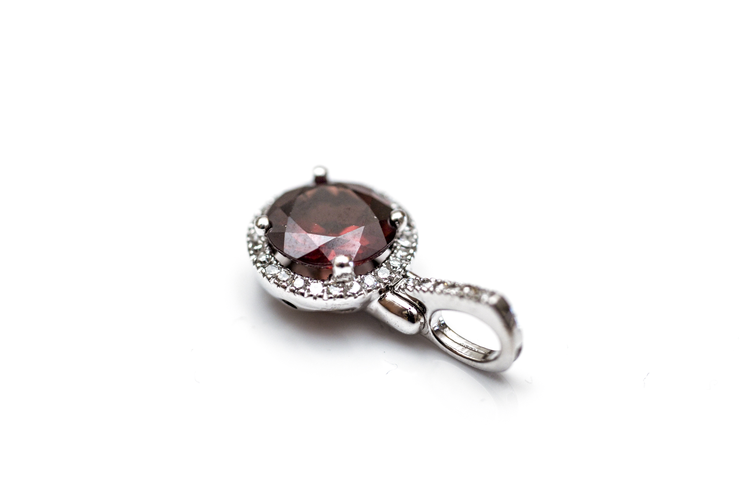 10K White Gold and Garnet Pendant with a Diamond Halo