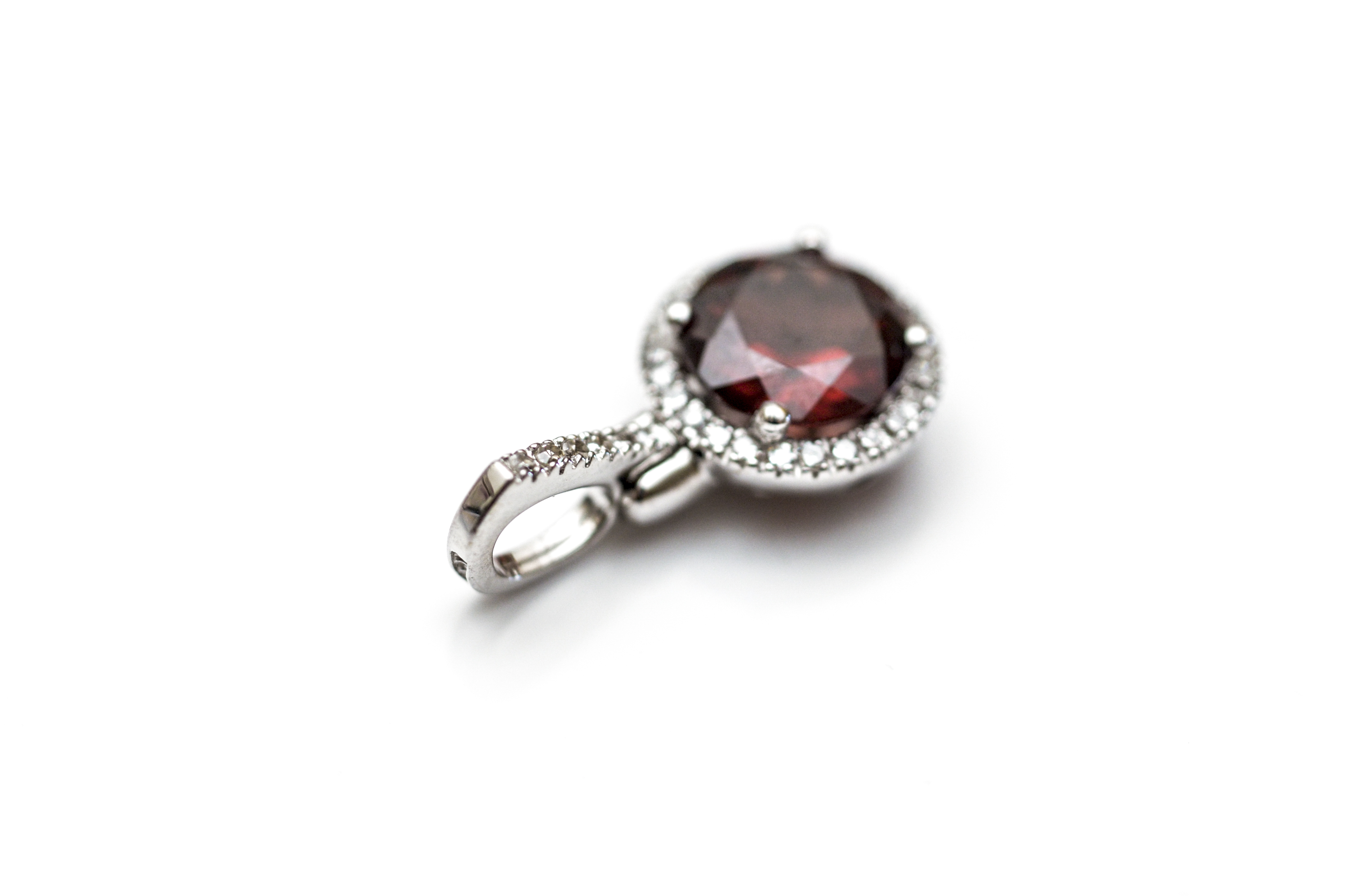 10K White Gold and Garnet Pendant with a Diamond Halo