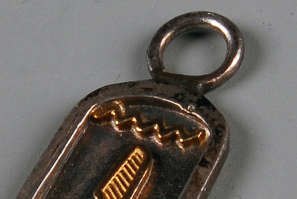 Sterling Silver and 14 Karat Gold Cartouche