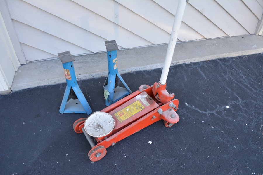 Floor Jack, Two Jack Stands, Hydraulic Jack and a Work Rolling Cart