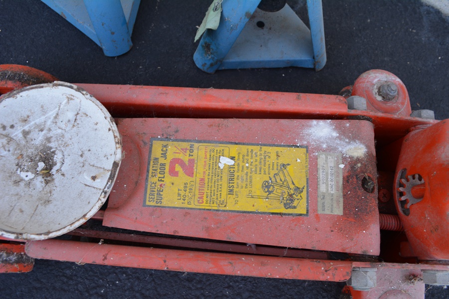 Floor Jack, Two Jack Stands, Hydraulic Jack and a Work Rolling Cart