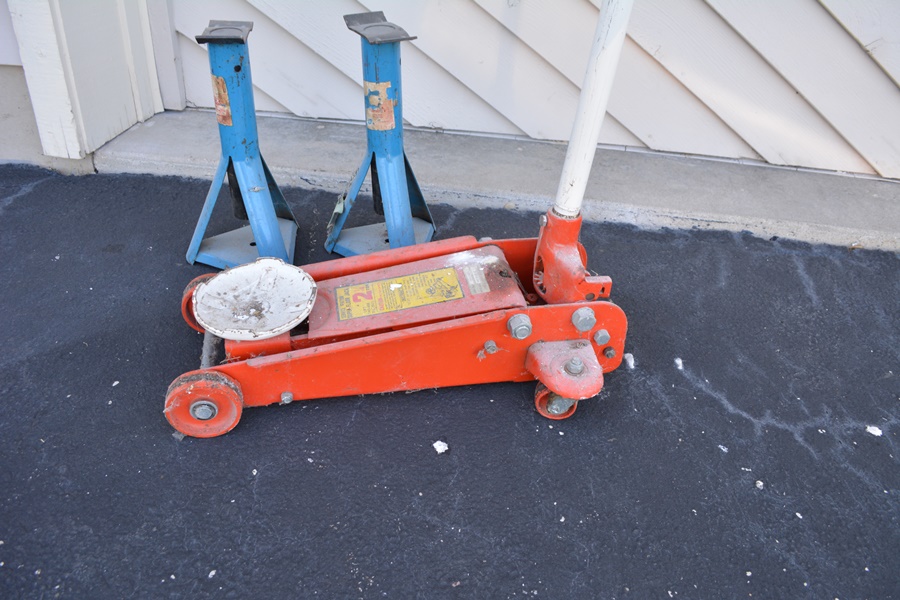 Floor Jack, Two Jack Stands, Hydraulic Jack and a Work Rolling Cart