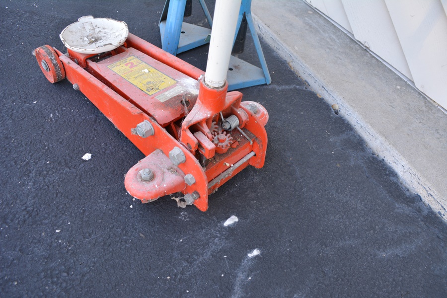 Floor Jack, Two Jack Stands, Hydraulic Jack and a Work Rolling Cart