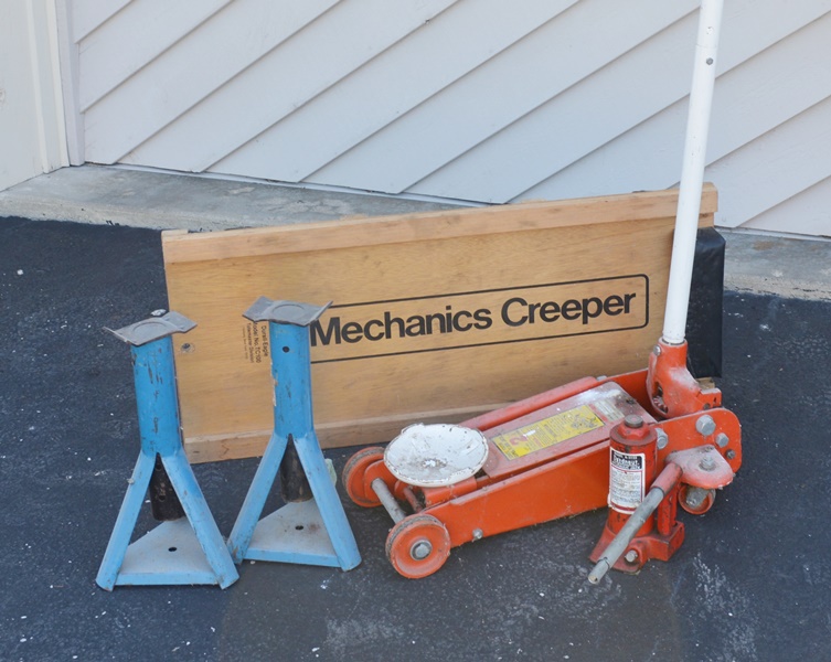 Floor Jack, Two Jack Stands, Hydraulic Jack and a Work Rolling Cart