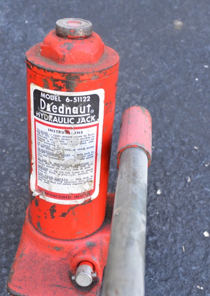 Floor Jack, Two Jack Stands, Hydraulic Jack and a Work Rolling Cart