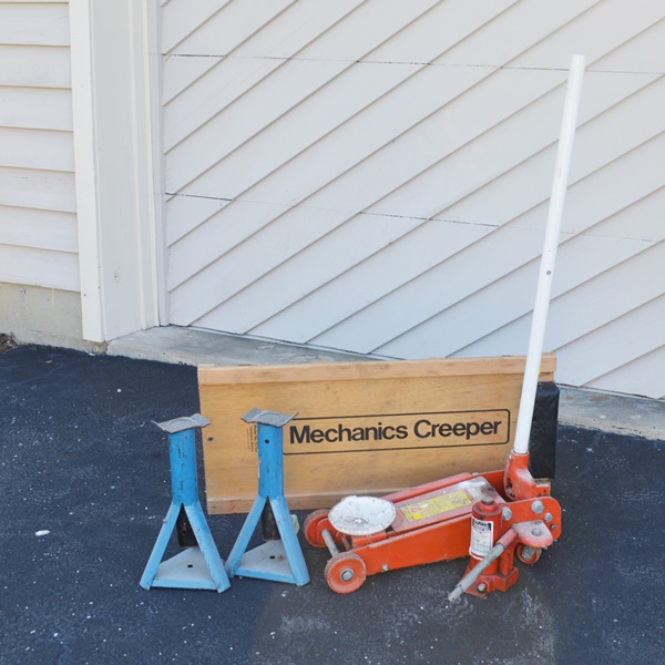 Floor Jack, Two Jack Stands, Hydraulic Jack and a Work Rolling Cart