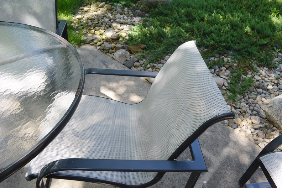 Brown Jordan Quantum Collection PatioTable, Four Chairs, Spring Base Chair and Ottoman