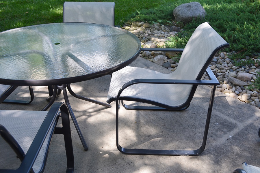 Brown Jordan Quantum Collection PatioTable, Four Chairs, Spring Base Chair and Ottoman