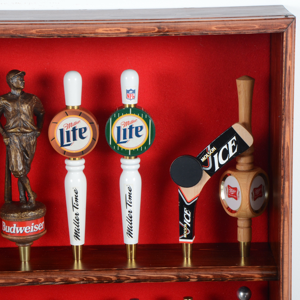 Collection of Bar Tap Handles in Display Case