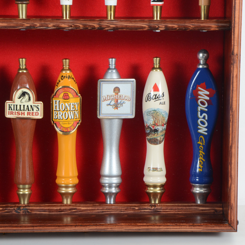 Collection of Bar Tap Handles in Display Case