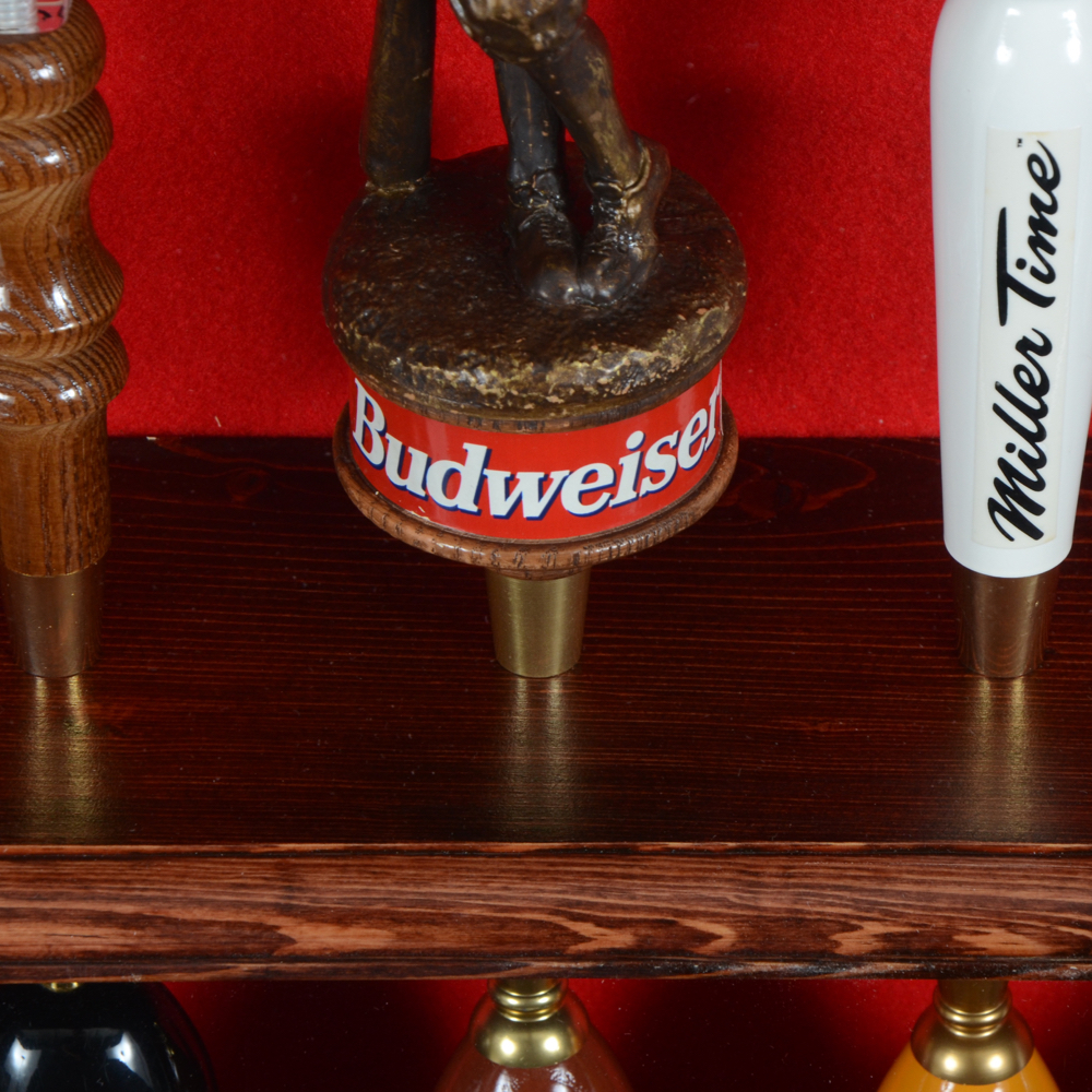 Collection of Bar Tap Handles in Display Case