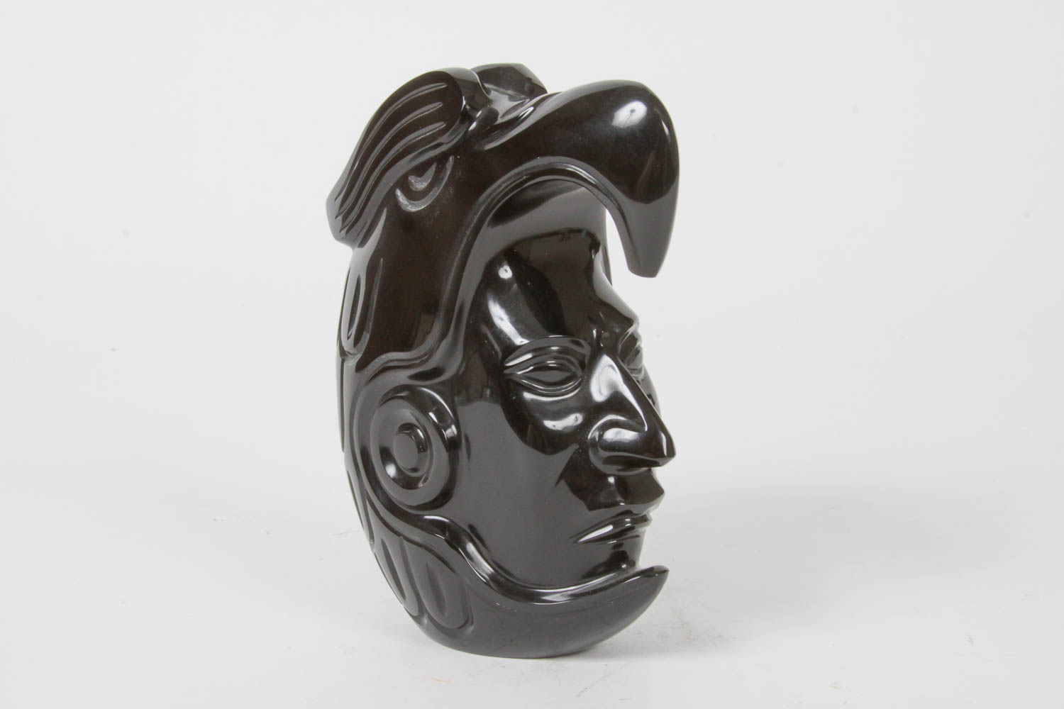 Obsidian Bookend of Man Wearing Ceremonial Head Dress