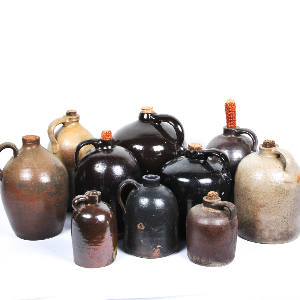 Assortment of Antique Stoneware Whiskey Jugs