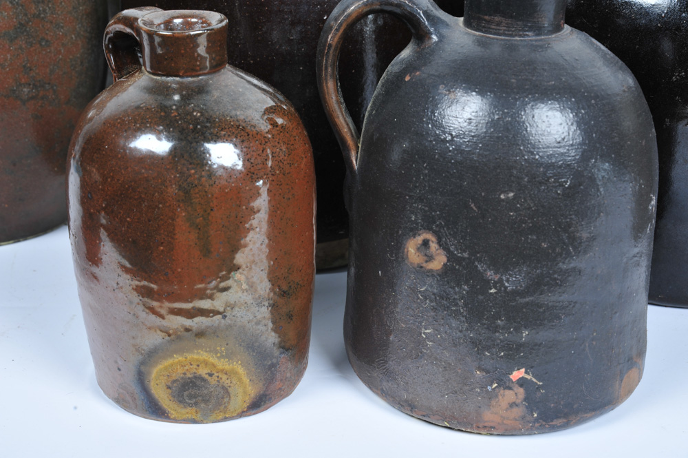 Assortment of Antique Stoneware Whiskey Jugs