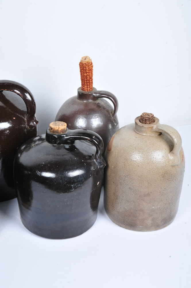 Assortment of Antique Stoneware Whiskey Jugs
