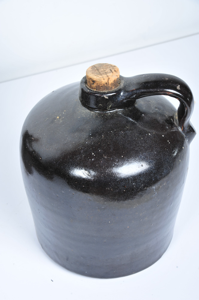 Assortment of Antique Stoneware Whiskey Jugs