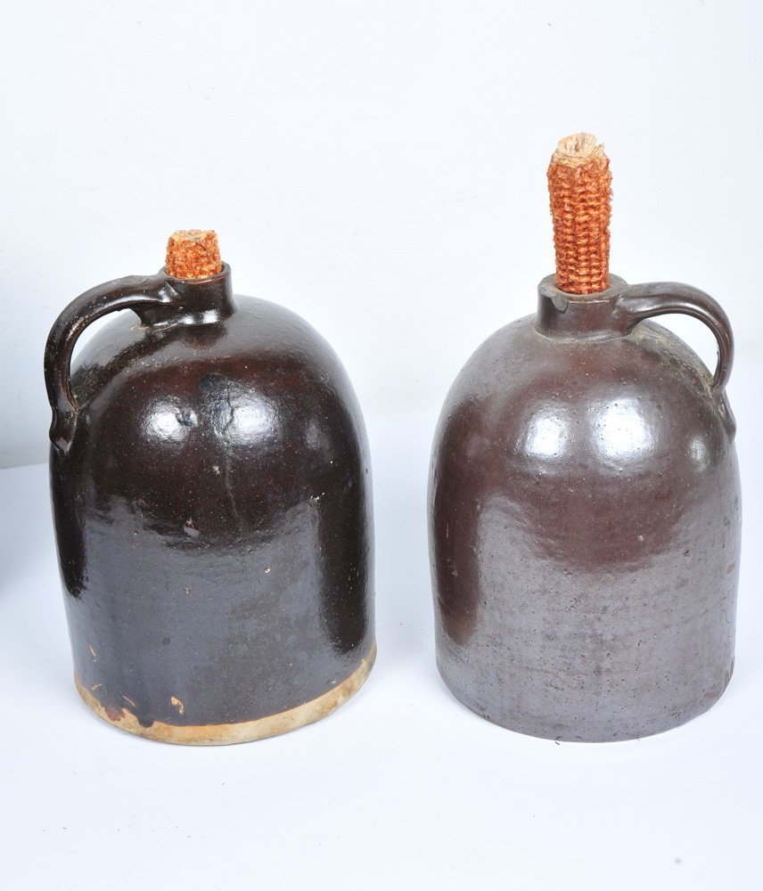 Assortment of Antique Stoneware Whiskey Jugs