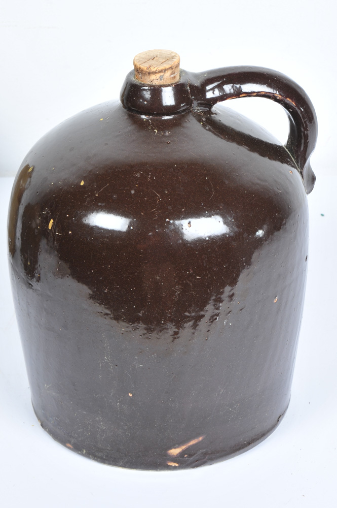 Assortment of Antique Stoneware Whiskey Jugs