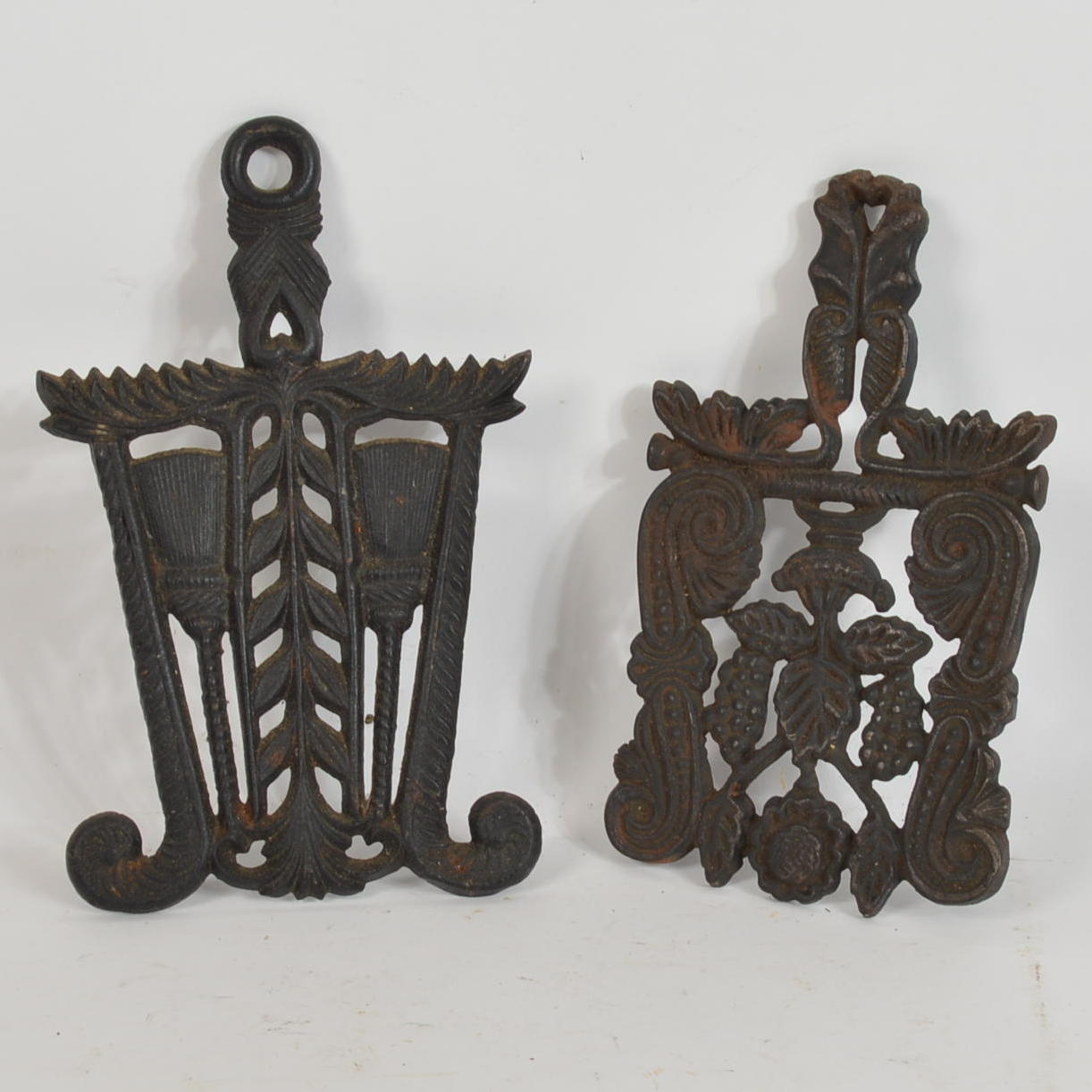 Pair of Vintage Ornate Cast Iron Trivets