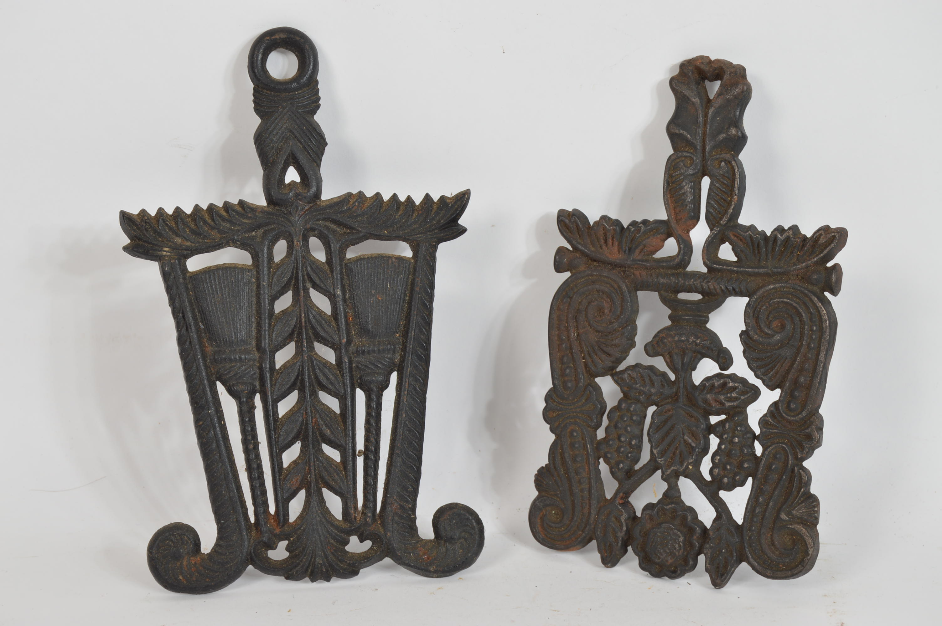 Pair of Vintage Ornate Cast Iron Trivets