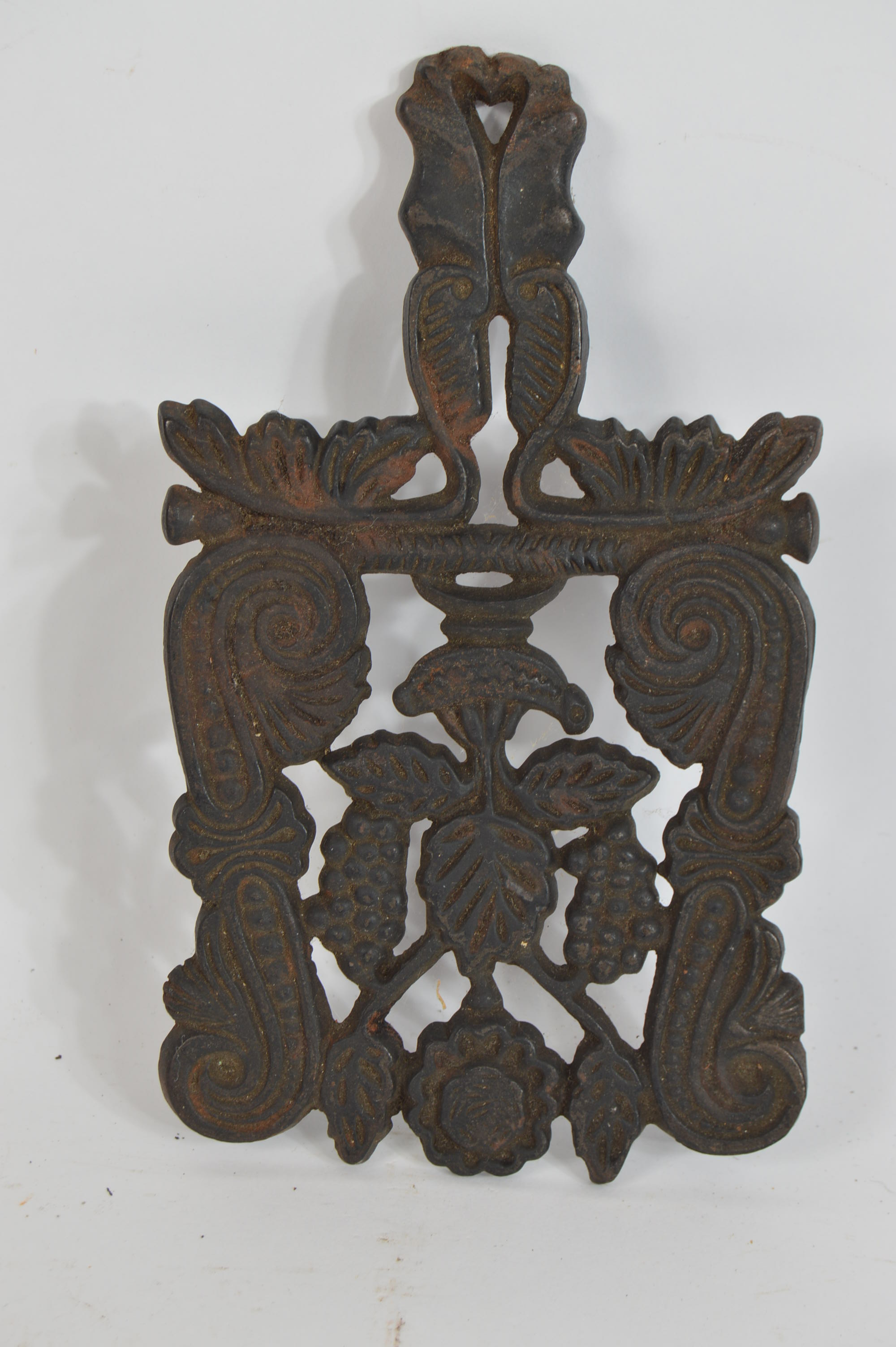 Pair of Vintage Ornate Cast Iron Trivets