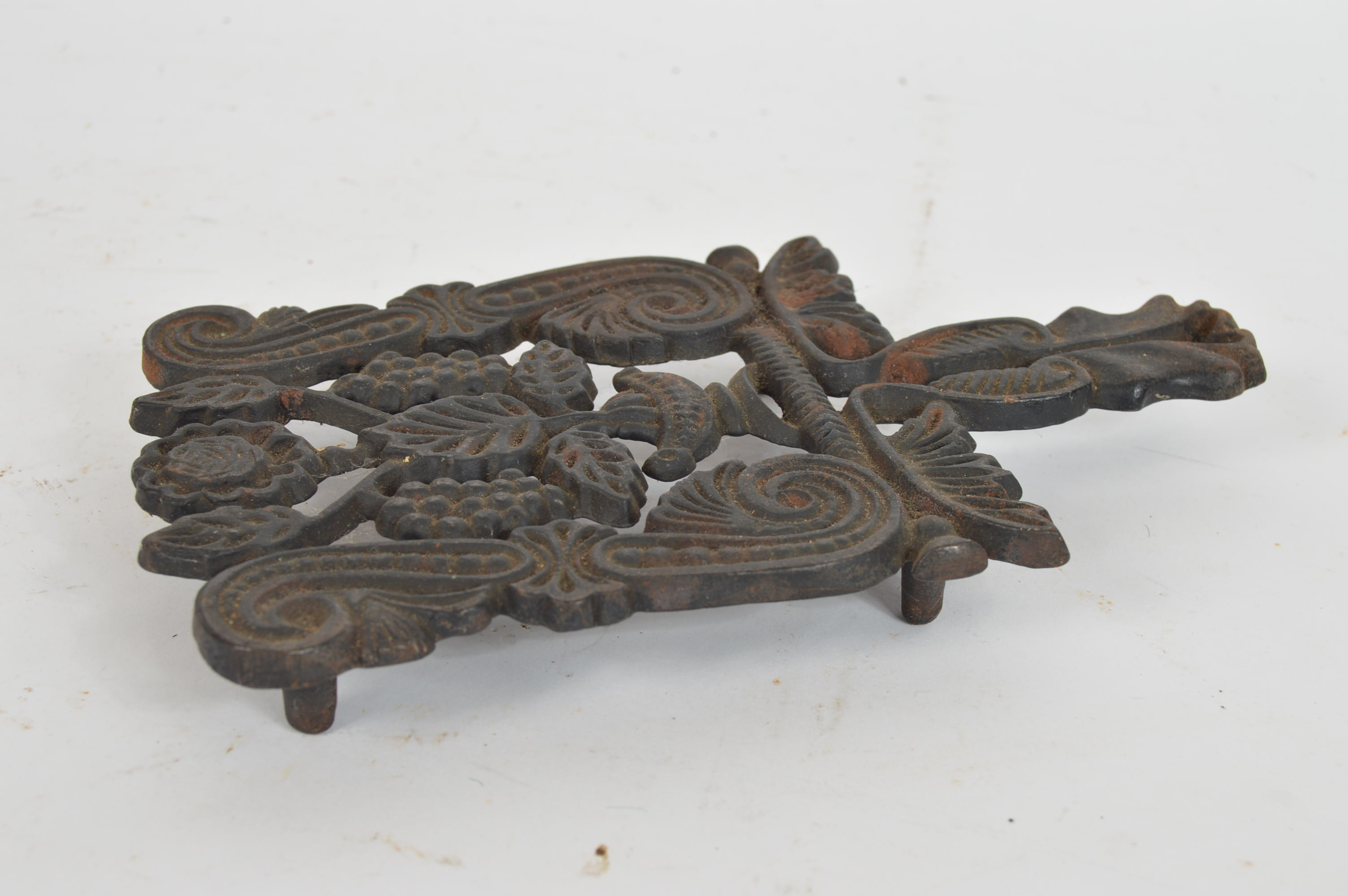 Pair of Vintage Ornate Cast Iron Trivets