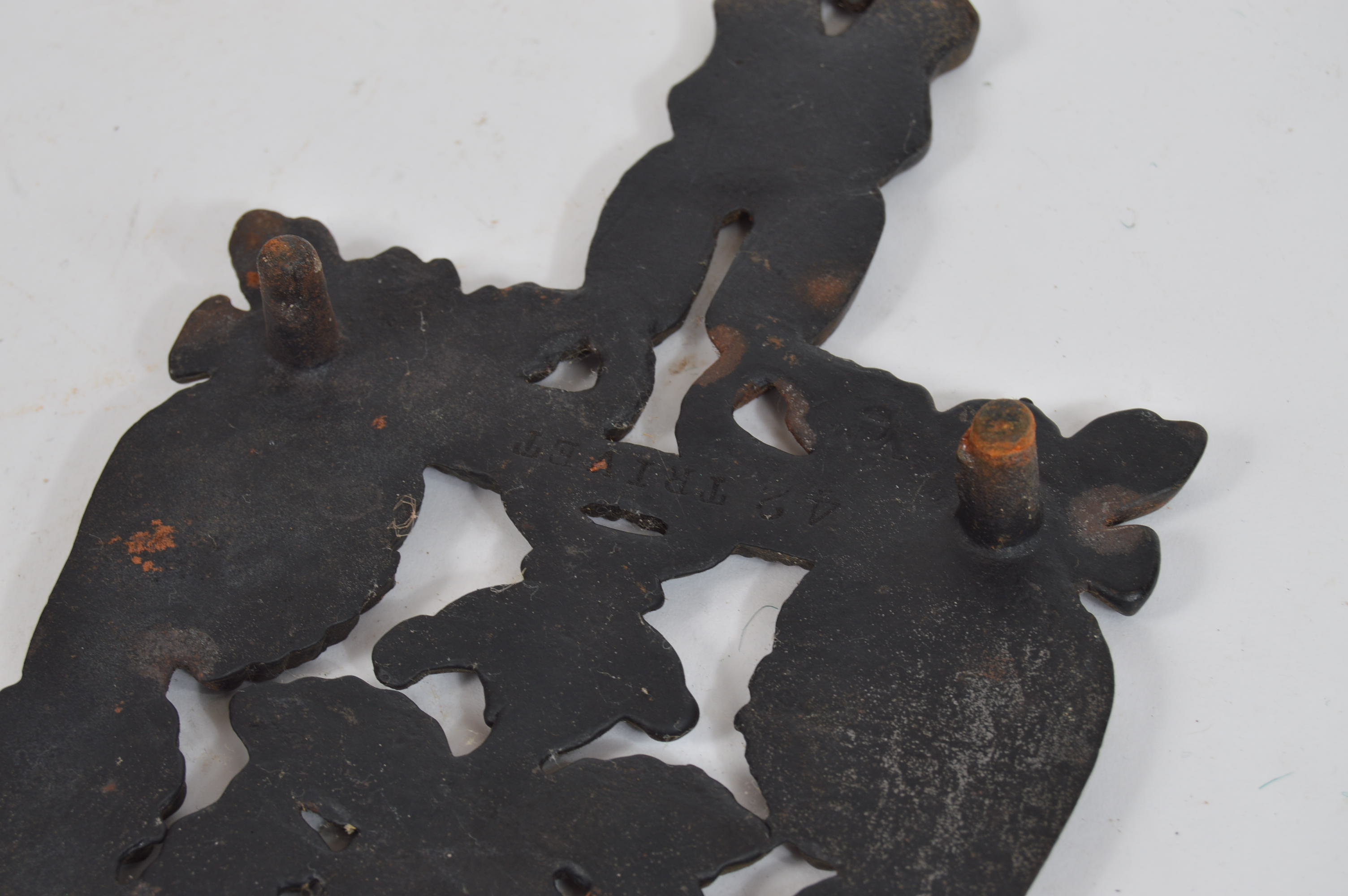 Pair of Vintage Ornate Cast Iron Trivets