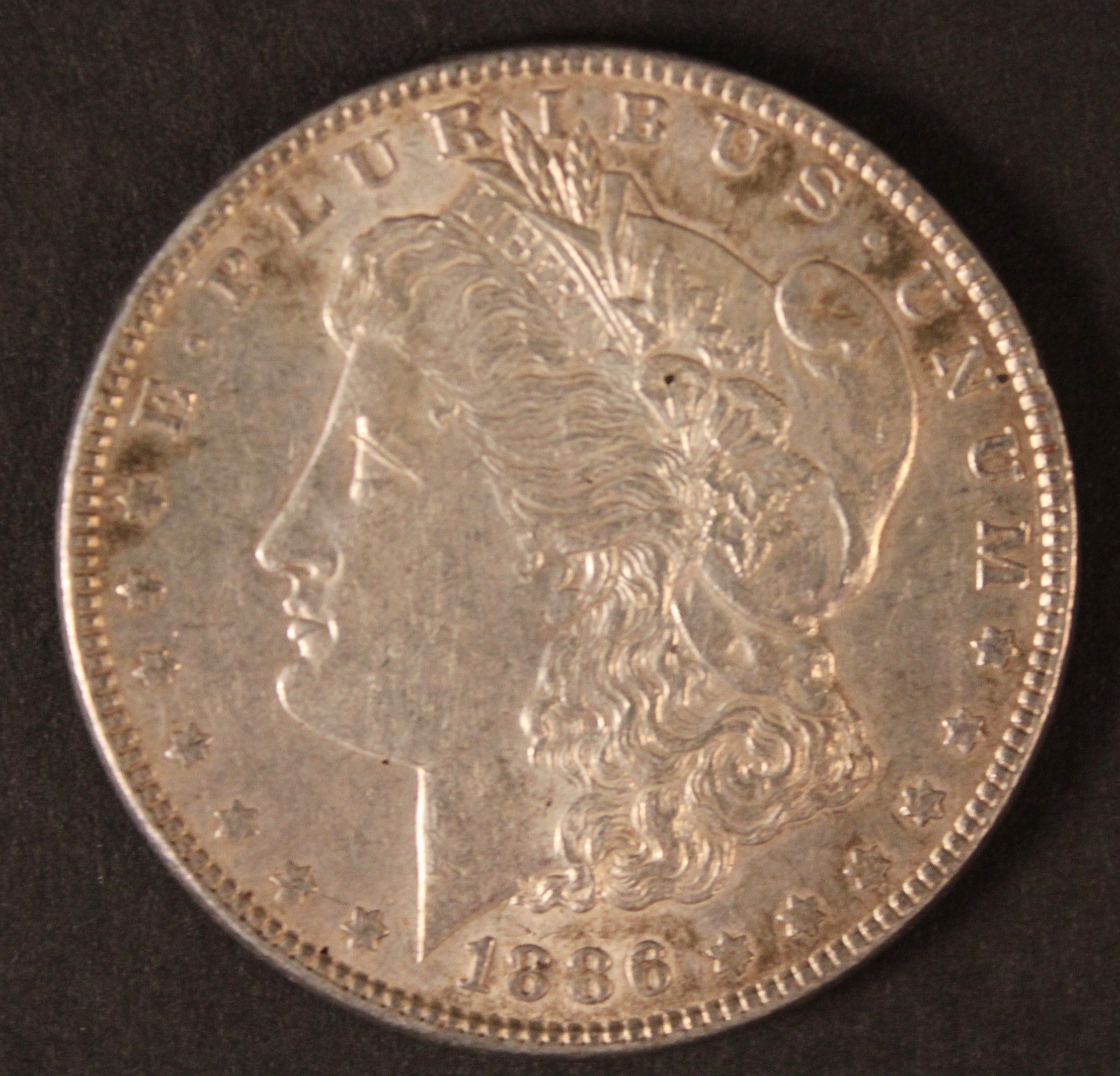 1886 and 1887 Morgan Silver Dollars