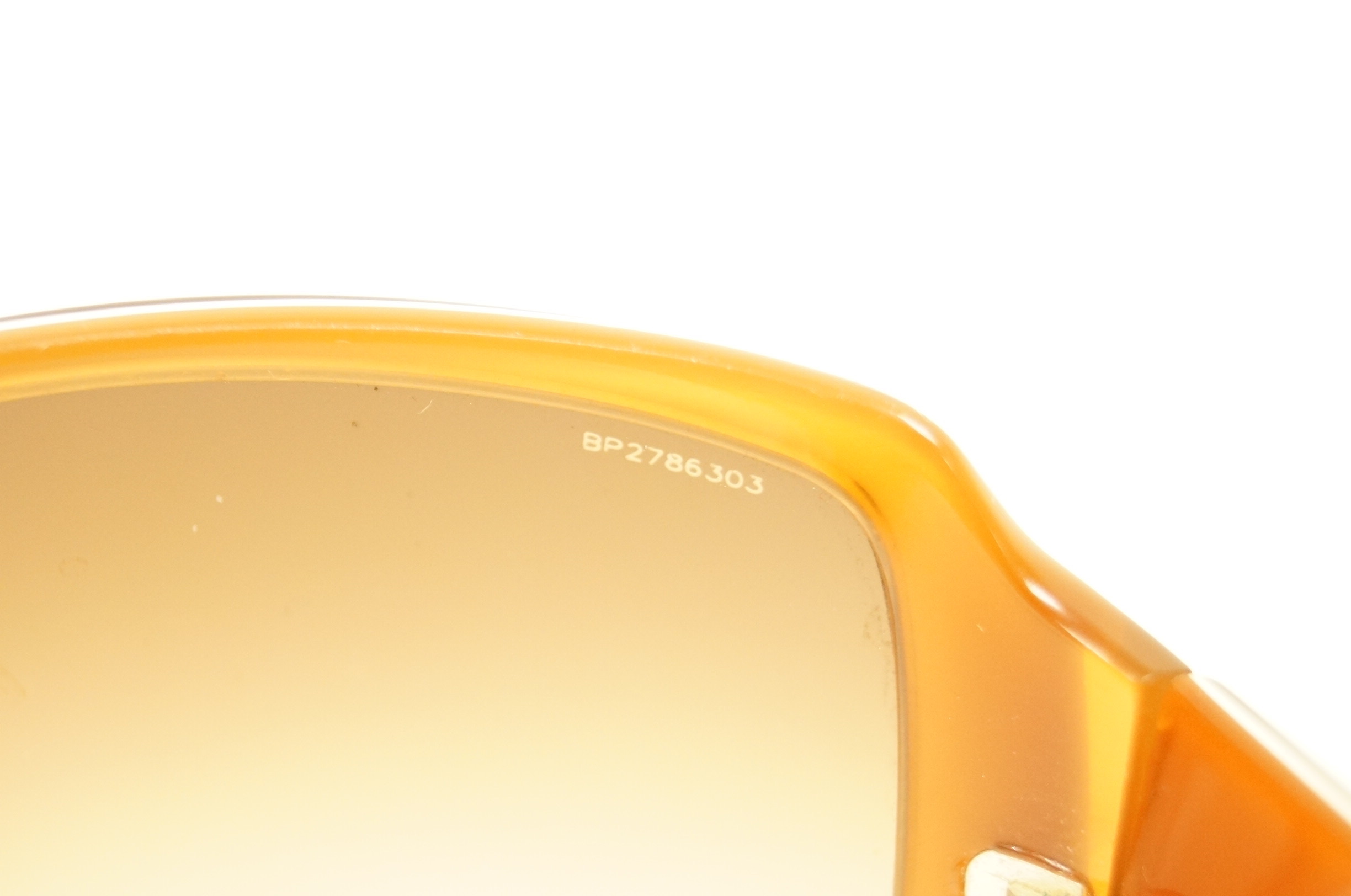 Pair of Prada Sunglasses