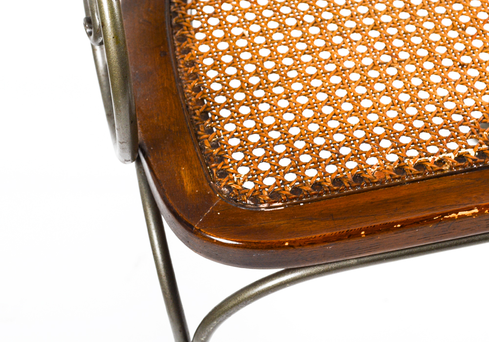 Four Caned Wrought Iron Chairs