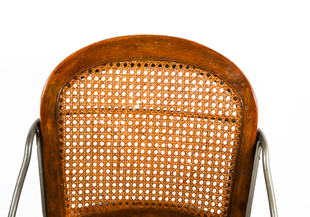 Four Caned Wrought Iron Chairs