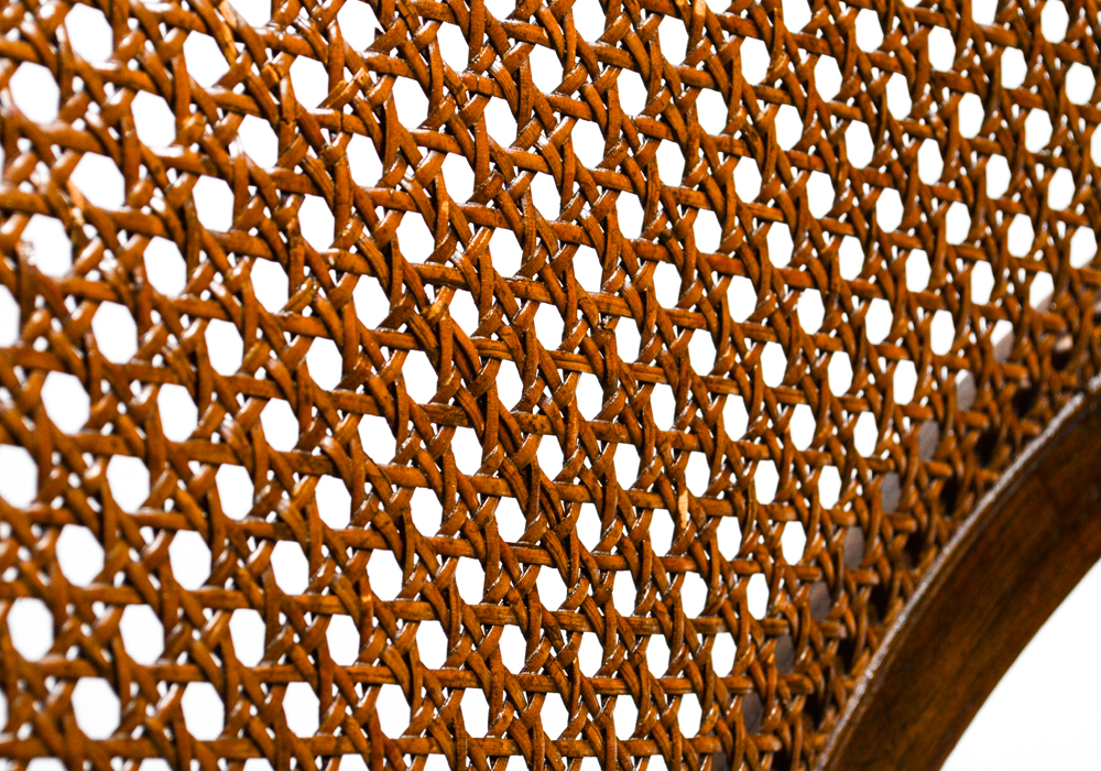 Four Caned Wrought Iron Chairs