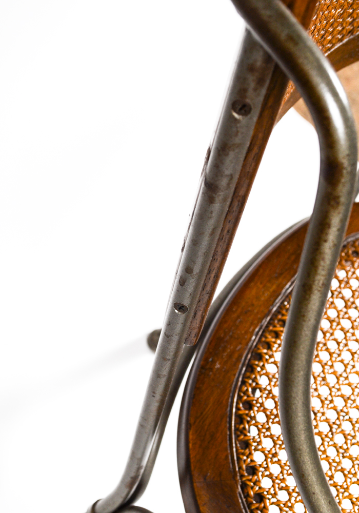 Four Caned Wrought Iron Chairs