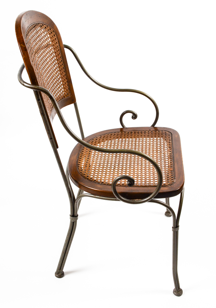 Four Caned Wrought Iron Chairs
