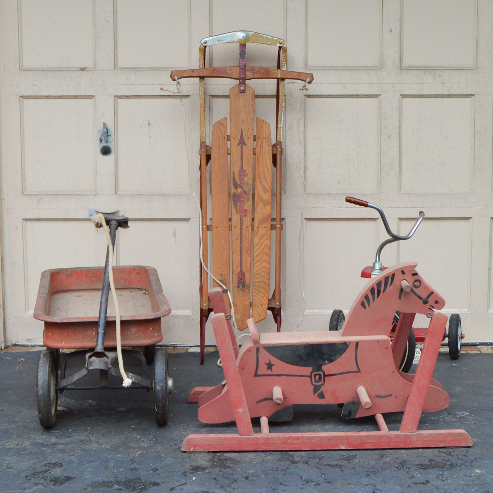 Vintage Radio Flyer Wagon, Flexible Flyer Model 51J Sled, Roadmaster Tricycle and Red Bouncy Horse