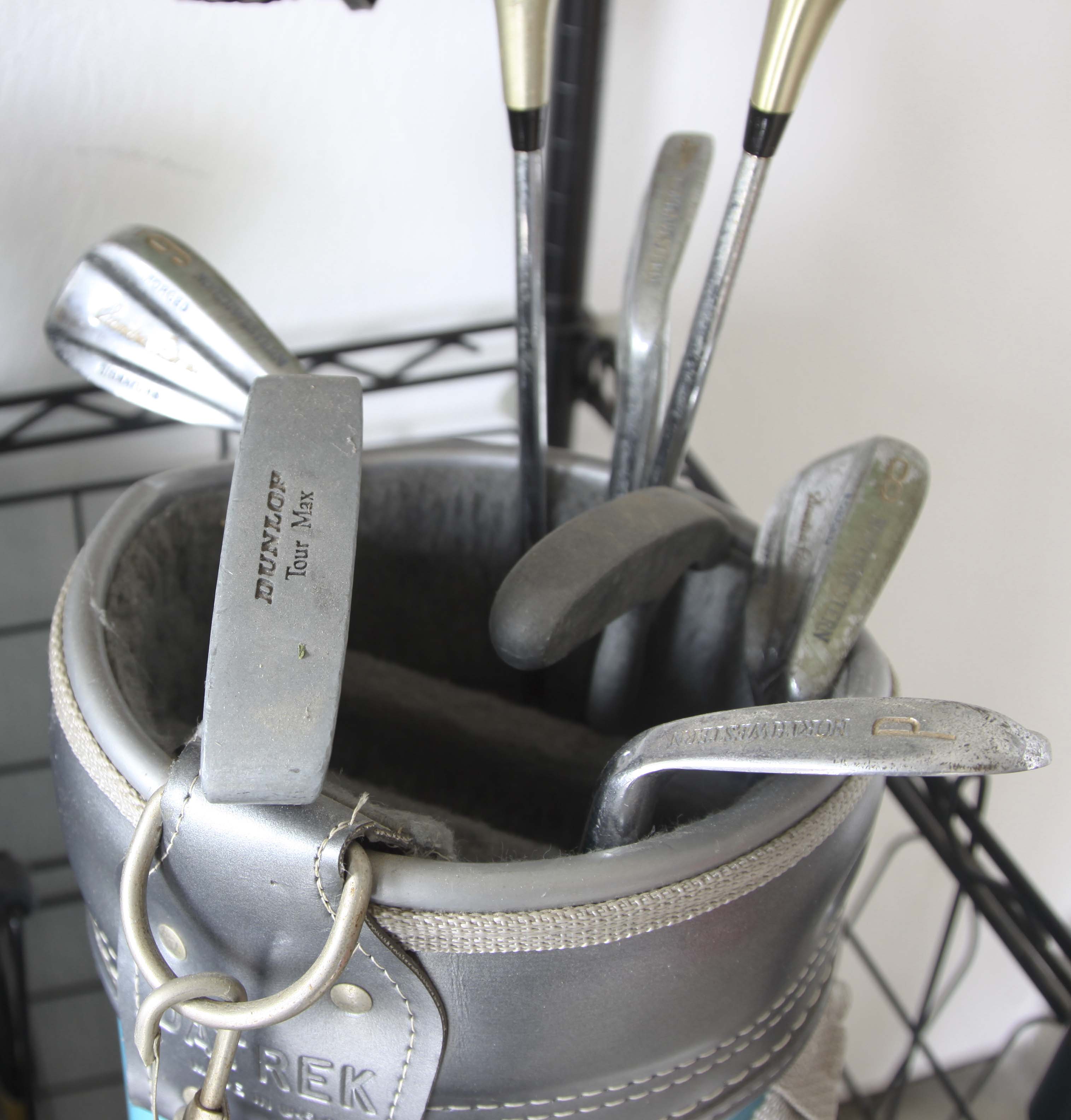 Golf Clubs and Sporting Goods with Storage Rack