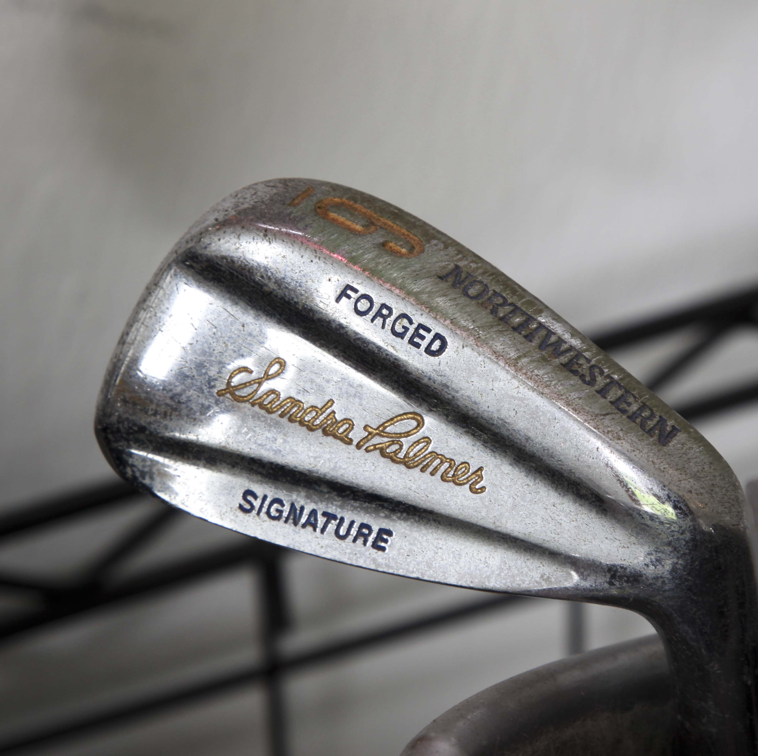 Golf Clubs and Sporting Goods with Storage Rack