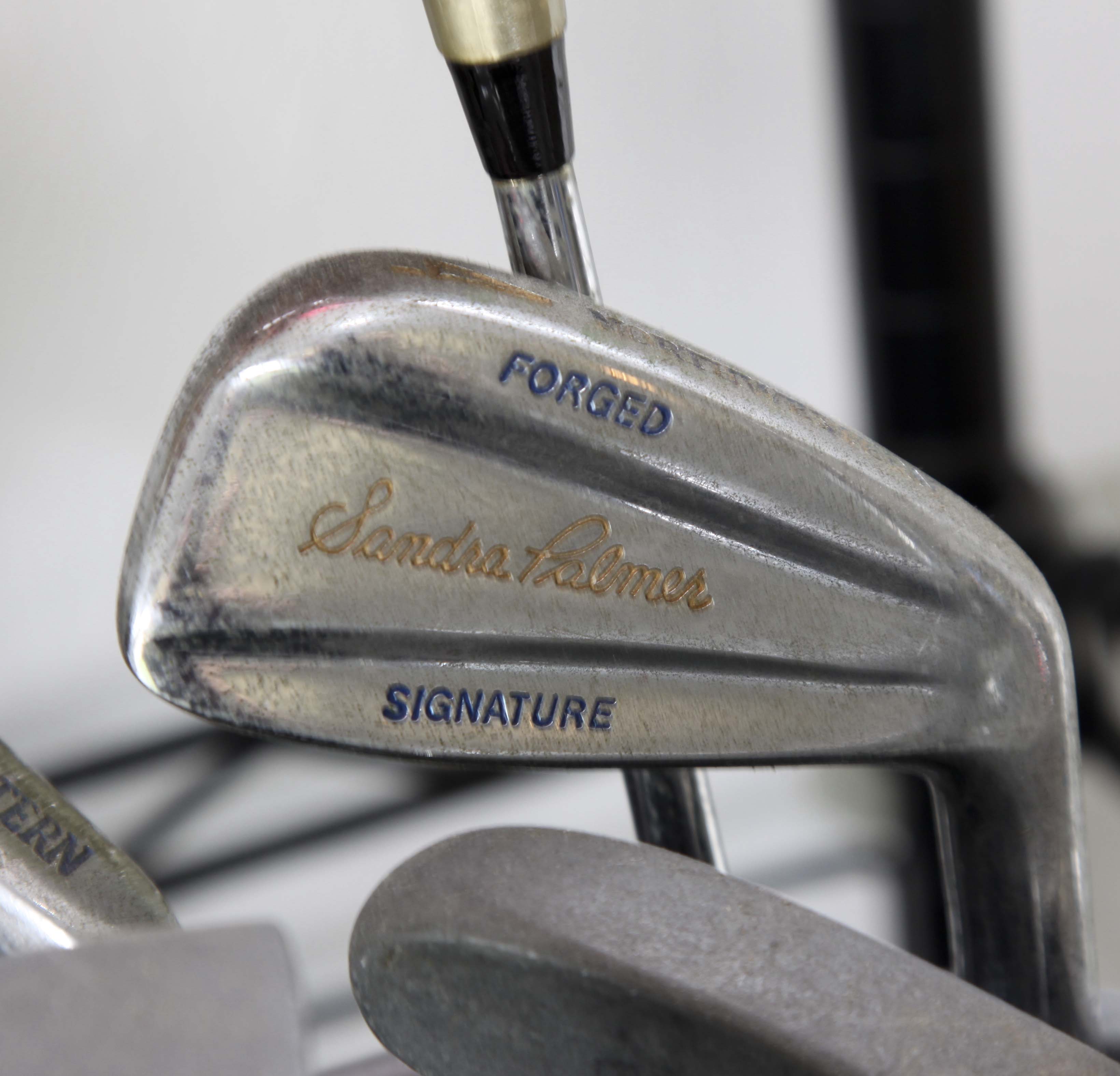 Golf Clubs and Sporting Goods with Storage Rack