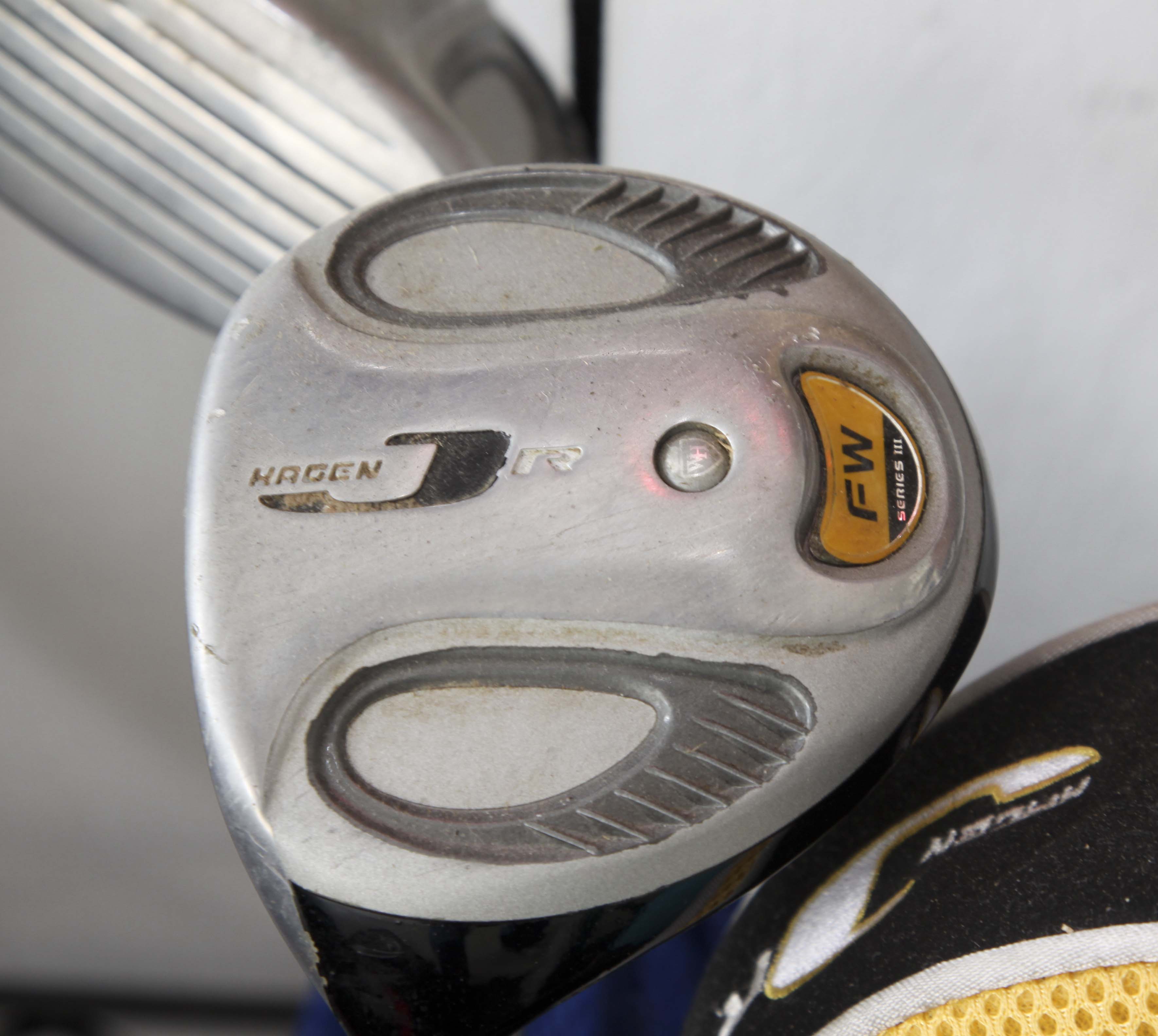 Golf Clubs and Sporting Goods with Storage Rack