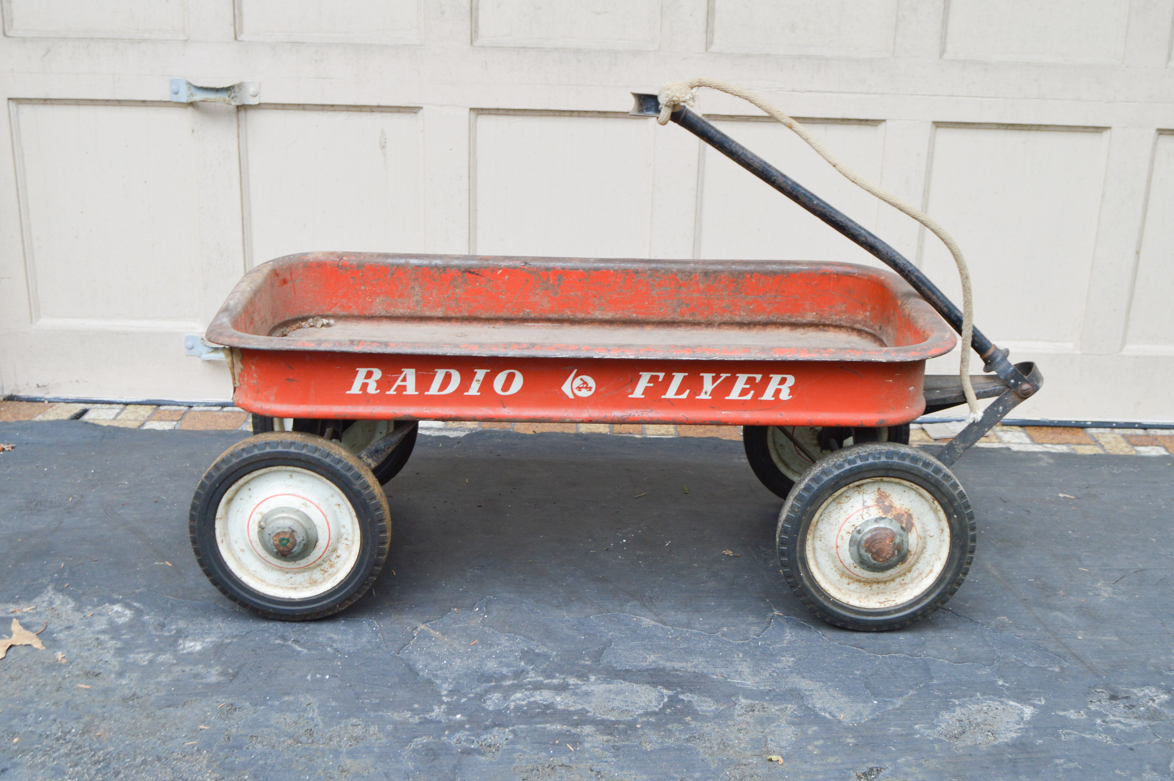 Vintage Radio Flyer Wagon, Flexible Flyer Model 51J Sled, Roadmaster Tricycle and Red Bouncy Horse