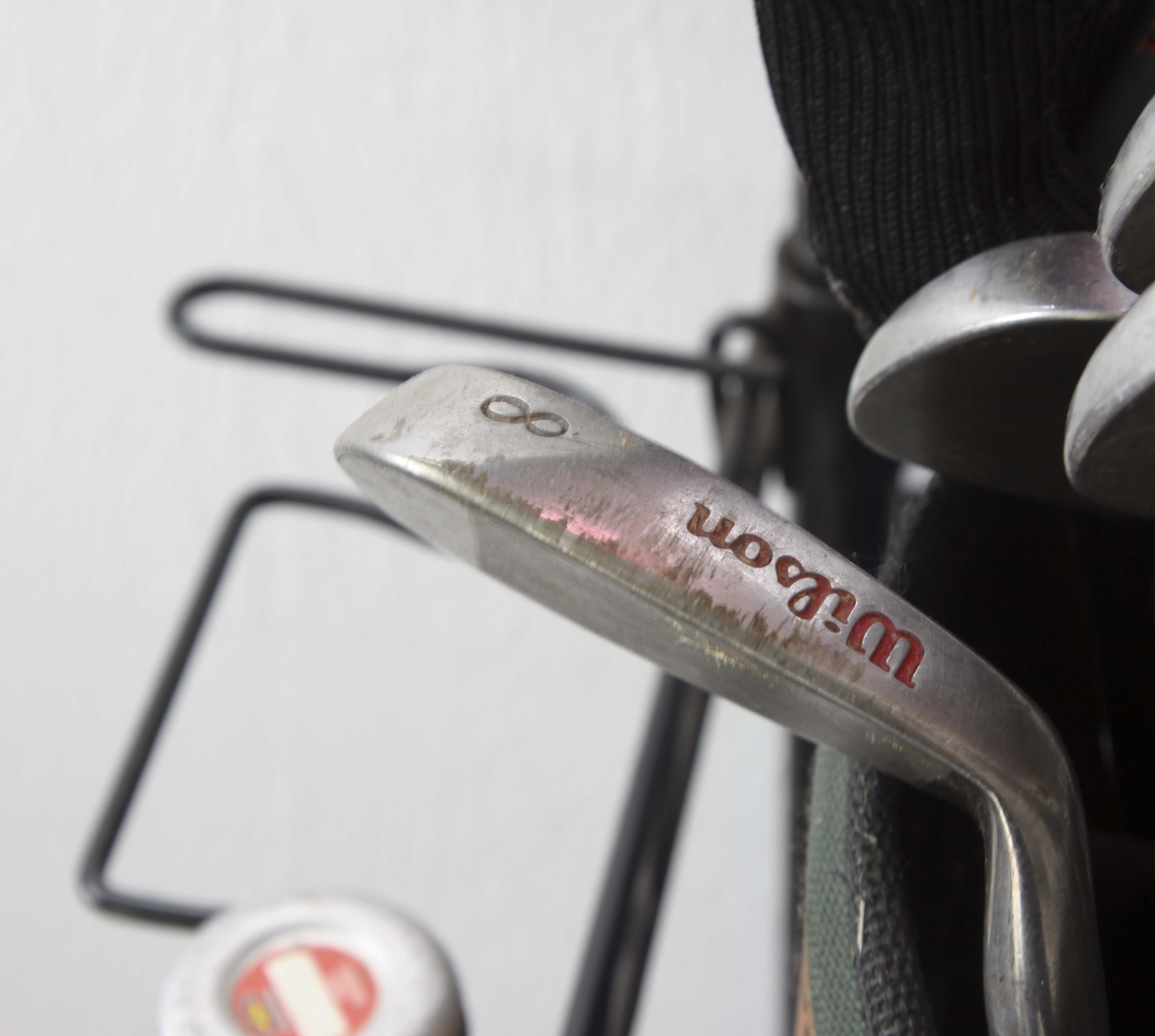 Golf Clubs and Sporting Goods with Storage Rack