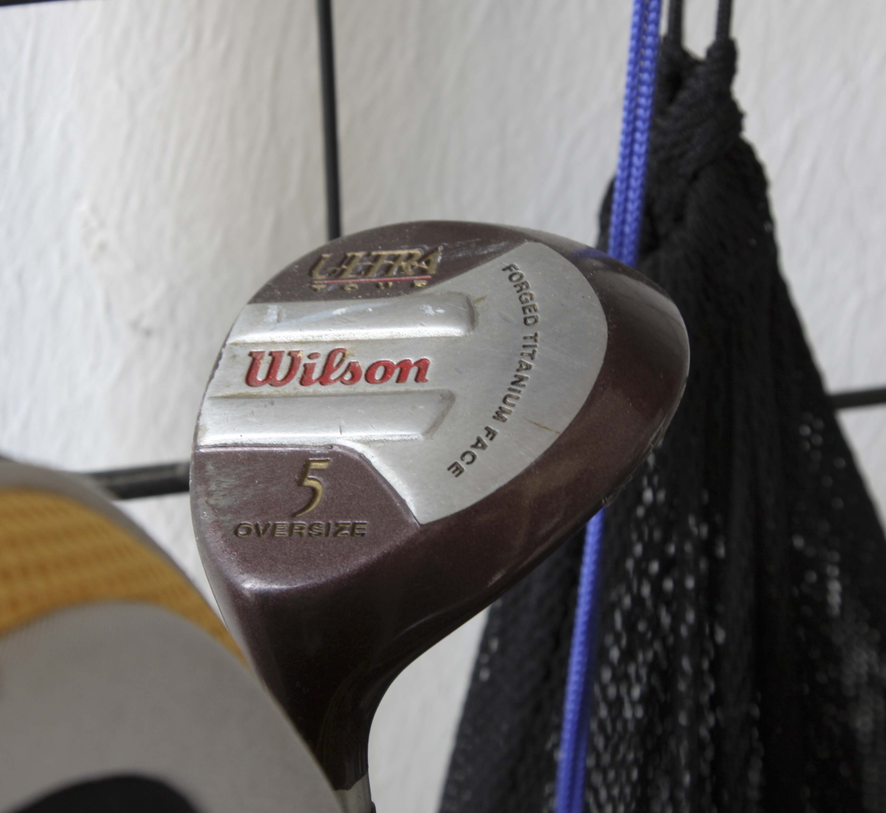 Golf Clubs and Sporting Goods with Storage Rack