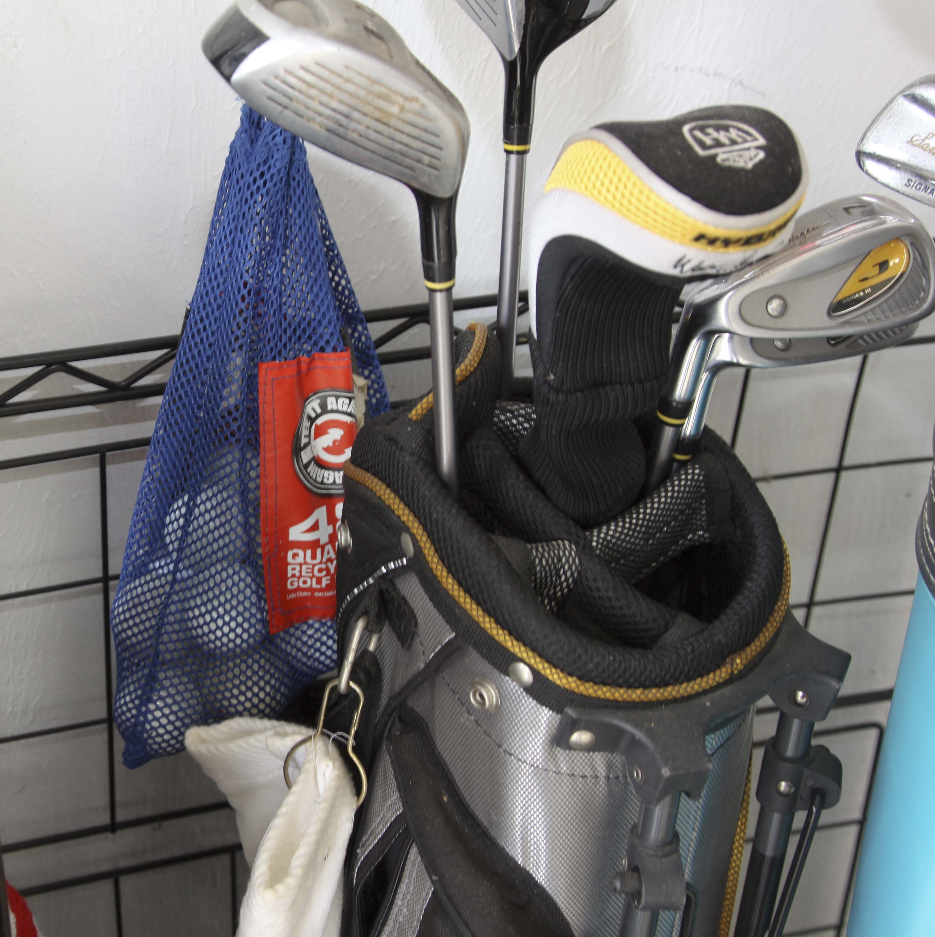 Golf Clubs and Sporting Goods with Storage Rack